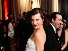 Milla Jovovich’s stunt double from a Resident Evil film has dropped a lawsuit against producers after she was injured during filming (Ian West/PA)