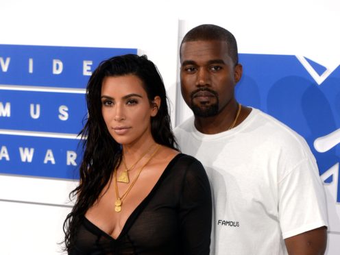 Kim Kardashian and Kanye West (PA)