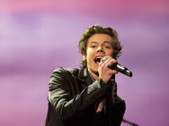 Harry Styles has reflected on his time in One Direction and said he avoided experimenting with drugs for fear of risking the band’s success (Isabel Infantes/PA)