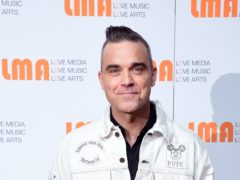 Robbie Williams says he will be voting for the first time in the General Election (Ian West/PA)
