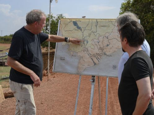 Jeremy Clarkson, Richard Hammond and James May map out their journey (Amazon Prime Video/PA)