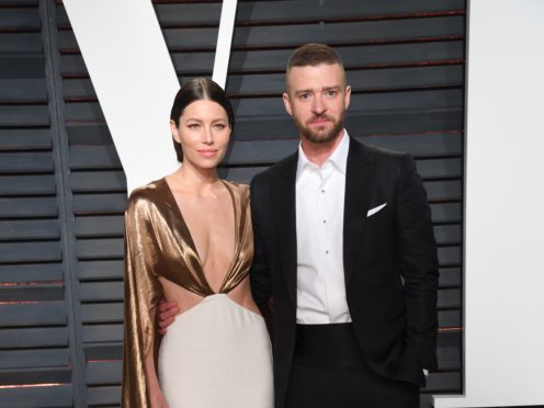 Justin Timberlake has apologised to wife Jessica Biel after he was pictured holding hands with a co-star (PA)