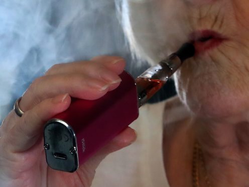 A woman vaping (Peter Byrne/PA)