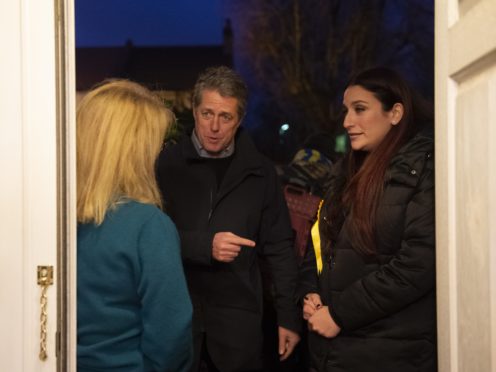 Liiberal Democrat candidate for Finchley and Golders Green, Luciana Berger and Hugh Grant canvassing in Finchley (David Mirzoeff/PA)