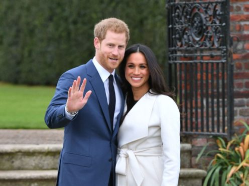 The Duke and Duchess of Sussex were pictured on a Christmas card with baby son Archie (Dominic Lipinski/PA)