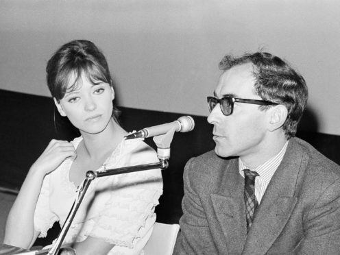 Anna Karina and director Jen-Luc Godard in 1965 (AP)