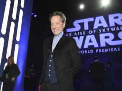 Richard E Grant has revealed security around the plot of the latest Star Wars film was so tight he did not tell his wife or daughter the name of his character (AP Photo/Chris Pizzello)
