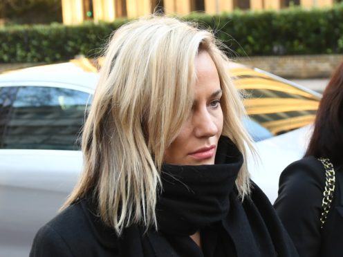 TV presenter Caroline Flack arrives at Highbury Corner Magistrates’ Court charged with assault (Joe Giddens/PA)