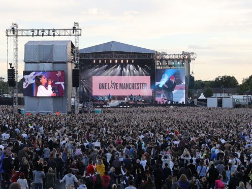 Ariana Grande and Mac Miller on stage (Owen Humphreys/PA)