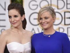 Tina Fey, left, and Amy Poehler will host next year’s Golden Globes (John Shearer/Invision/AP)