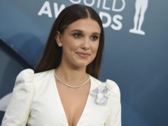 Millie Bobby Brown was among the stars hitting the silver carpet (Jordan Strauss/Invision/AP)