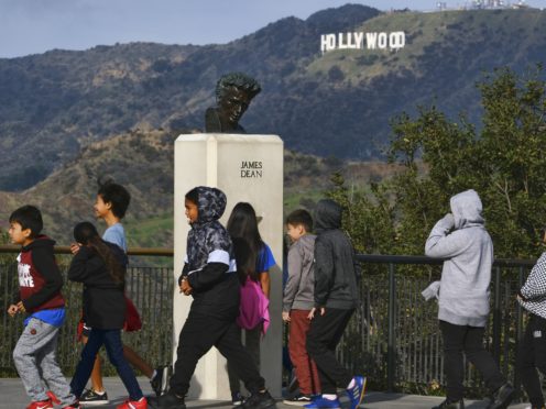School children walk past a bust of actor James Dean during a field trip (Richard Vogel/AP)