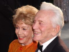 Actor Kirk Douglas has died age 103. Pictured with his wife Anne Buydens (Yui Mok/PA)
