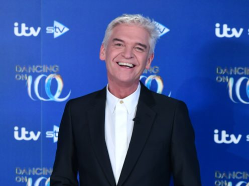 Phillip Schofield presents Dancing On Ice with his This Morning co-host Holly Willoughby (Ian West/PA)