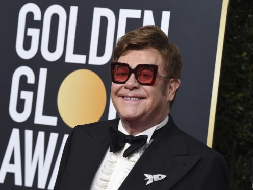 Sir Elton John, seen here at the recent Golden Globe Awards, says he is determined to complete concerts in New Zealand this week as scheduled despite a bout of illness (Jordan Strauss/AP)