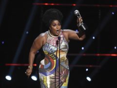 Lizzo wins the award for entertainer of the year at the 51st NAACP Image Awards (Chris Pizzello/AP)