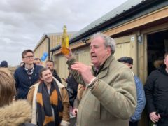 Jeremy Clarkson stands outside his newly-opened farm shop
