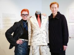 A suit signed by a host of A-list celebrities has fetched £16,000 after it was auctioned off to raise funds for a campaign to save late artist and filmmaker Derek Jarman’s cottage (Matt Alexander/PA)