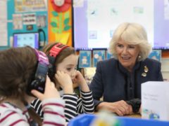 The Duchess of Cornwall speaking to year one pupils during a visit to Bousfield Primary School in London to celebrate World Book Day (Philip Toscano/PA)