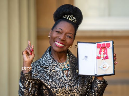 Floella Benjamin with her Dame Commander medal (Dominic Lipinski/PA)