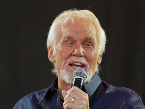 Kenny Rogers has died aged 81 (PA)