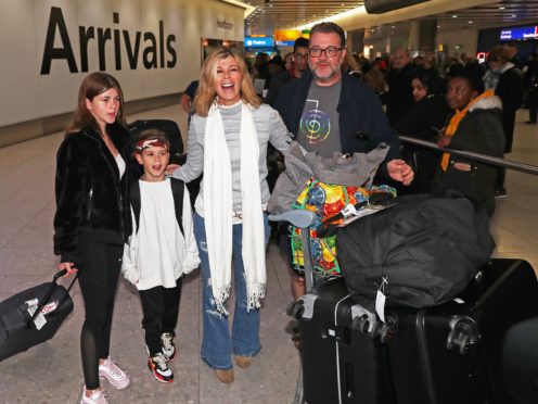 Kate Garraway with her husband and two children (Steve Parsons/PA)