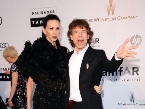 L’Wren Scott and Mick Jagger (Ian West/PA)