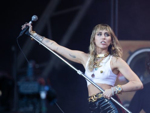 Miley Cyrus has been working with Dua Lipa (Aaron Chown/PA)