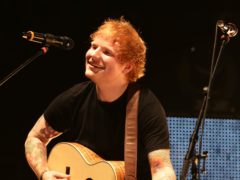 Ed Sheeran performing on stage during the Teenage Cancer Trust series of charity gigs (Yui Mok/PA)