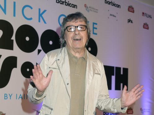 A bass guitar once belonging to former Rolling Stones star Bill Wyman has sold at auction for a record-breaking price (Yui Mok/PA)