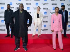Director Steve McQueen, second left, with cast members, left to right, Malachi Kirby, Rochenda Sandall, Letitia Wright and Shaun Parkes, socially distancing on the red carpet (Ian West/PA)