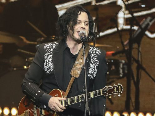 Alt-rocker Jack White will replace rising country music star Morgan Wallen as the musical guest on this week’s Saturday Night Live (Al Wagner/Invision/AP, File)