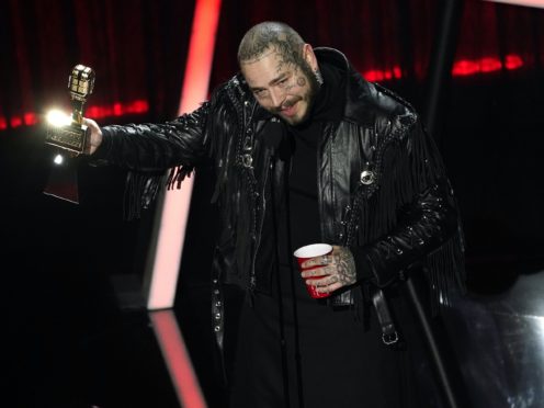 Post Malone was the big winner at the delayed Billboard Music Awards, taking home nine gongs including top artist (AP Photo/Chris Pizzello)