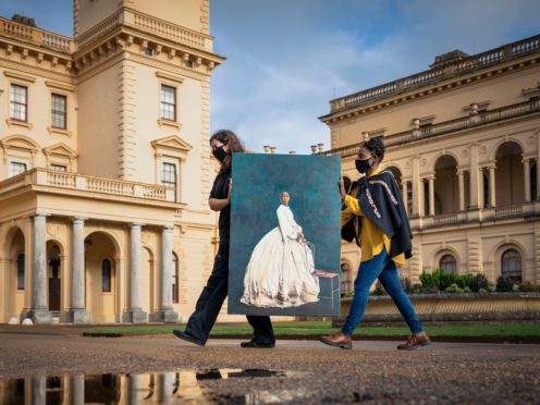 Artist Hannah Uzor with collections care assistant Kirsty Huggett and the new portrait at Osborne, Isle of Wight (English Heritage/PA)