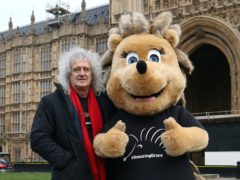 Brian May stands beside Grace the Hedgehog, mascot of the Save Me Trust (Jonathan Brady/PA)