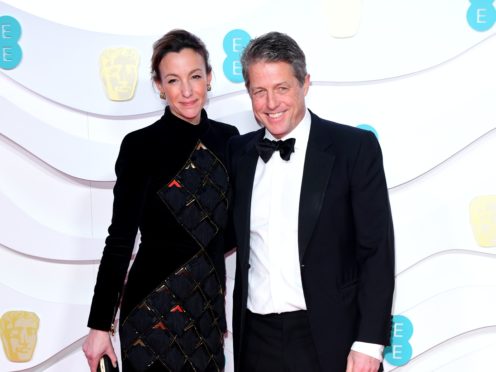 Hugh Grant says he and his wife had Covid-19 in February (Ian West/PA)