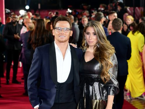 TV presenter Stacey Solomon has announced she and actor partner Joe Swash are engaged (Ian West/PA)