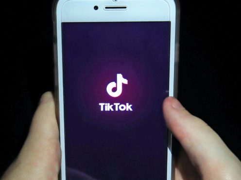 The TikTok app on a smartphone (Peter Byrne/PA)