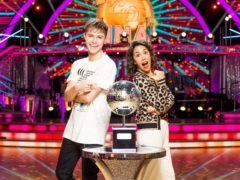 HRVY and Janette Manrara with the Strictly Come Dancing glitterball trophy (Guy Levy/BBC/PA)