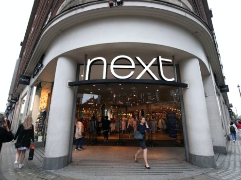 Next is forecasting profits of £670 million for 2021-22 (Yui Mok/PA)