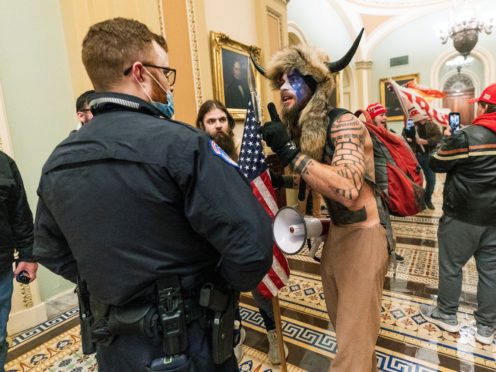 Supporters of Donald Trump are confronted by US Capitol Police (AP)