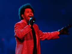 The Weeknd enlisted a small army of lookalikes for a glittering Super Bowl half-time show packed with hits (AP Photo/Chris Carlson)