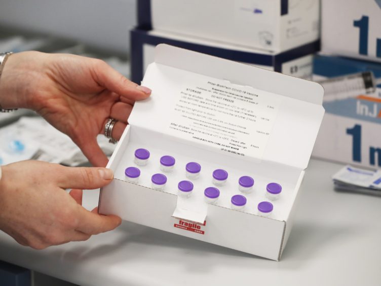 The UK has enough vaccine doses on order to inoculate its population three times over (Niall Carson/PA)
