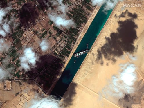 A satellite image shows the cargo ship Ever Given stuck in the Suez Canal in Egypt (Maxar Technologies/AP)