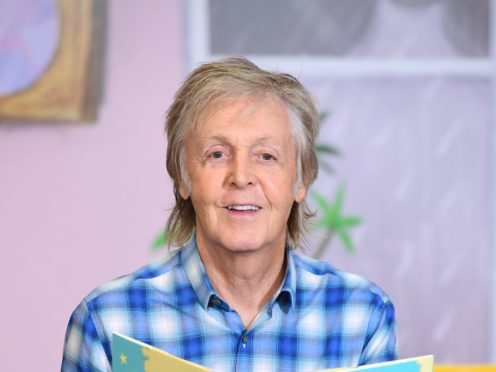 Paul McCartney during a signing session for his new book, Hey Grandude!, at Waterstones Piccadilly (Ian West/PA)