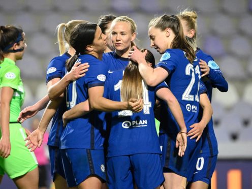 Pernille Harder is surrounded by her Chelsea team-mates after scoring (Zsolt Szigetvary/MTI via AP)