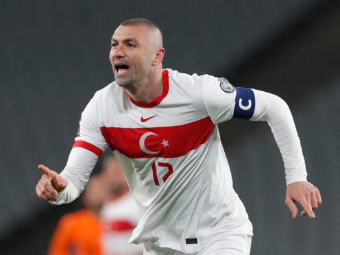 Turkey’s Burak Yilmaz scored a hat-trick in a surprise 4-2 win over the Netherlands (Murad Sezer/Pool/AP)