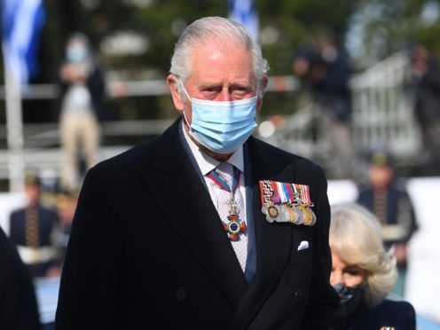 The Prince of Wales during a wreath-laying ceremony at the Memorial of the Unknown Soldier in Syntagma Square, Athens (PA)