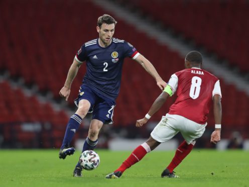 Full-back Stephen O’Donnell, left, believes Scotland are still heading in the right direction as they seek the first win of their World Cup qualifying campaign (Jane Barlow/PA)