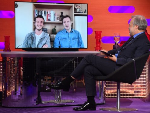 Micheal Richardson (left) and his father, Liam Neeson, are interviewed remotely by host Graham Norton for his BBC chat show (Matt Crossick/PA Wire)